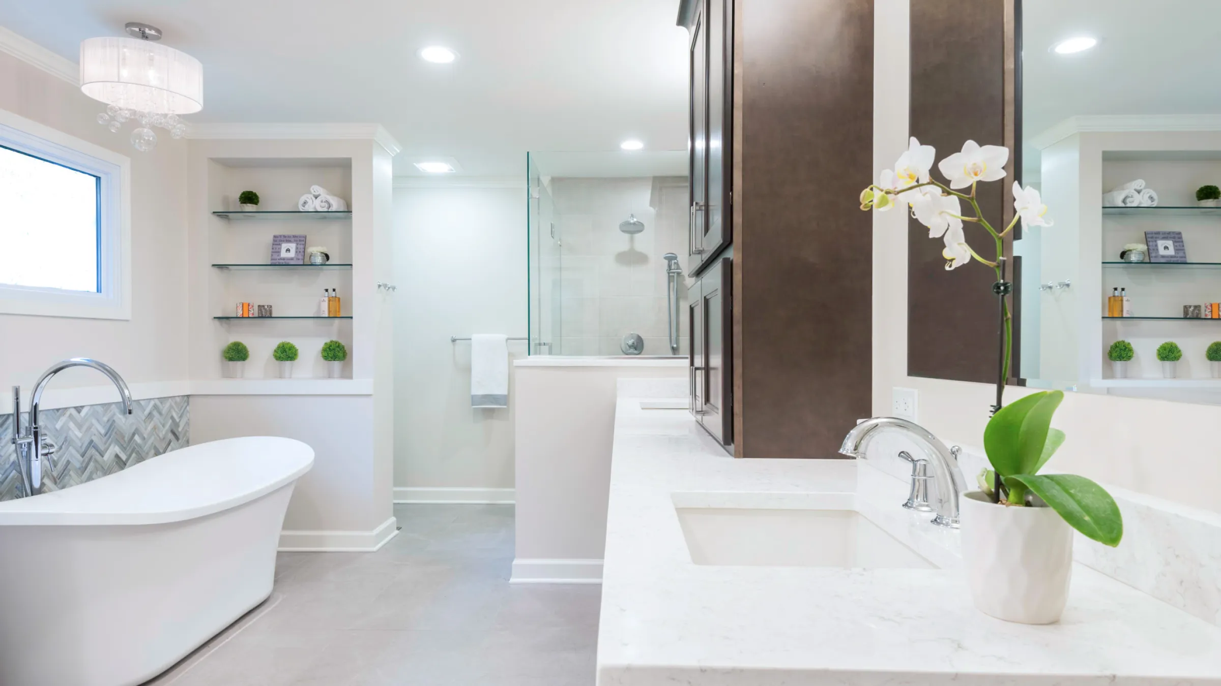 Modern Palatine primary bathroom remodel with soaking tub, custom vanity, quartz countertops, and glass shower.