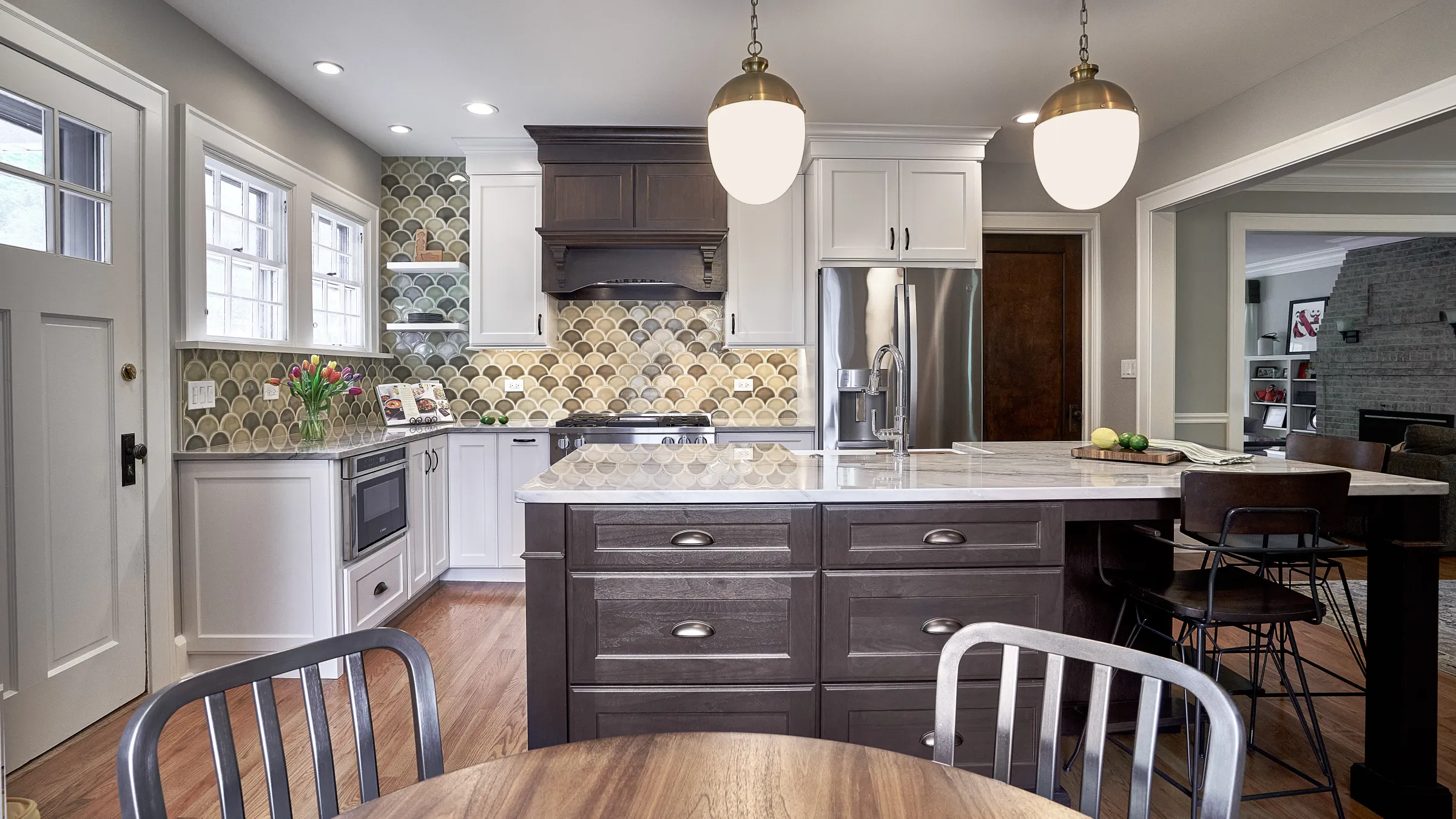 Arlington Heights kitchen remodel featuring custom cabinets, unique tile, and modern pendant lighting.