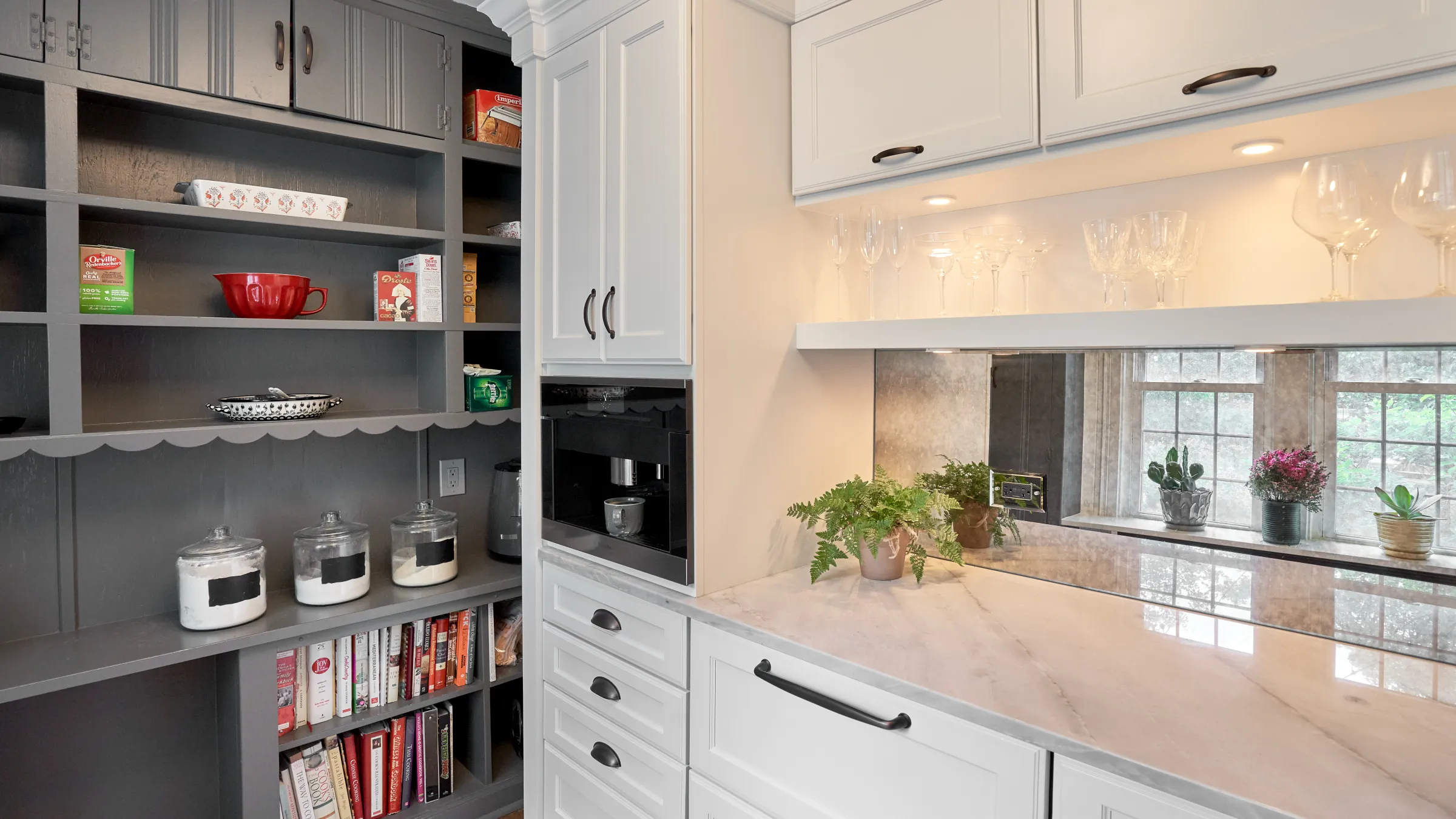 Arlington Heights Kitchen Renovation: Custom gray and white cabinets, marble countertops, built-in coffee maker.